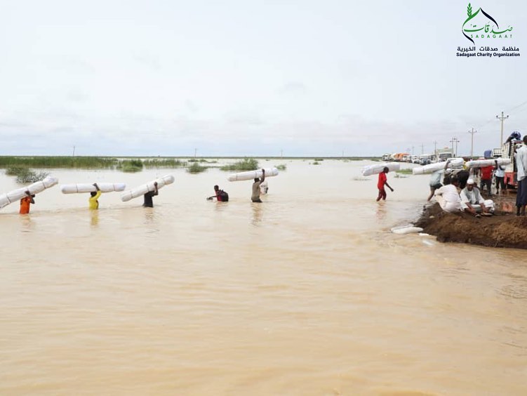 delivering aid to Al-Manaqil locality
